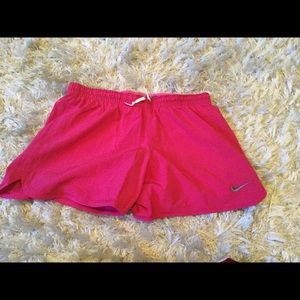 Pink Nike Shorts.